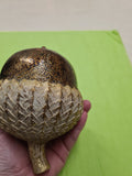 Decorative gold coloured acorn